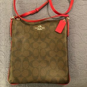 Coach brown crossbody red strap